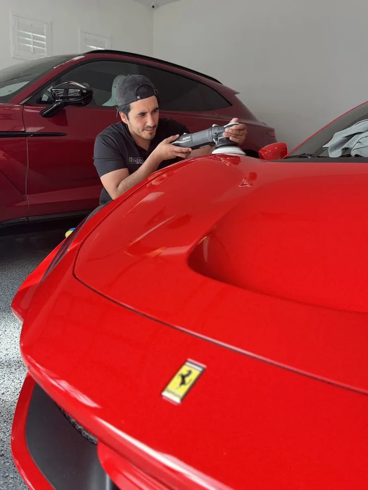Machine paint correction on a red Ferrari before a 5-year ceramic coating — The Detailers on Park, mobile auto detailing in Orlando, Florida